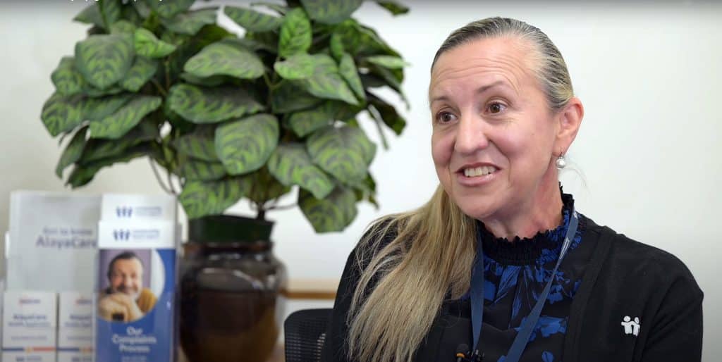 A screengrab of a woman with blonde hair giving an interview.